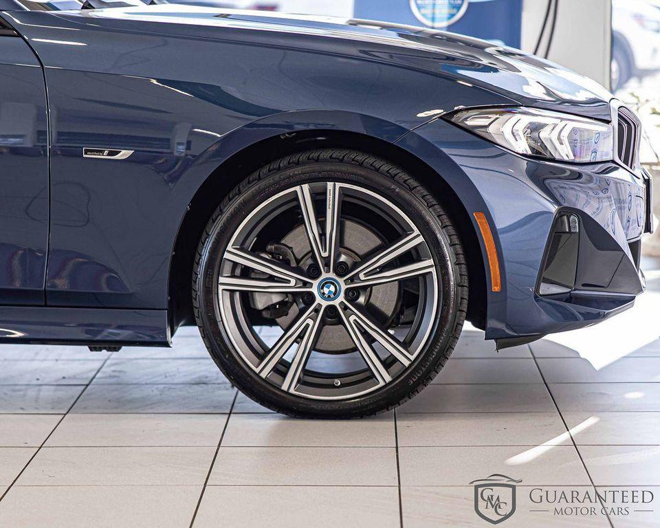 used 2023 BMW 330e car, priced at $38,930