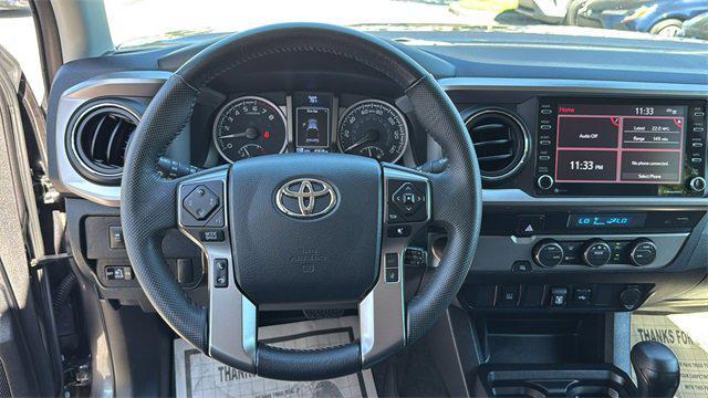 used 2023 Toyota Tacoma car, priced at $28,495