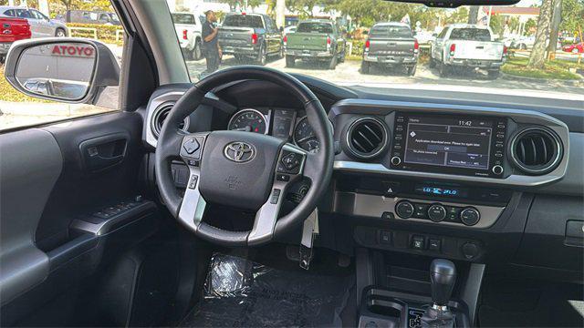 used 2021 Toyota Tacoma car, priced at $28,605