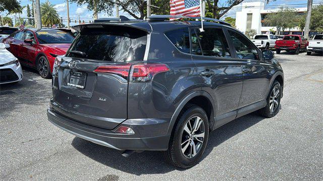 used 2018 Toyota RAV4 car, priced at $14,998