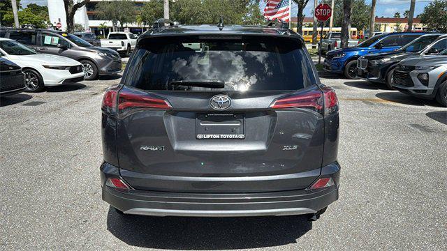 used 2018 Toyota RAV4 car, priced at $14,998