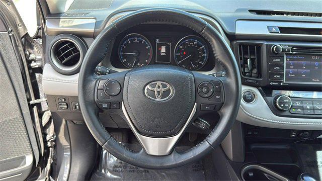 used 2018 Toyota RAV4 car, priced at $14,998