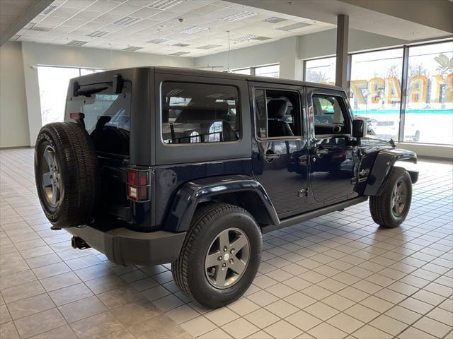 used 2013 Jeep Wrangler Unlimited car, priced at $15,850