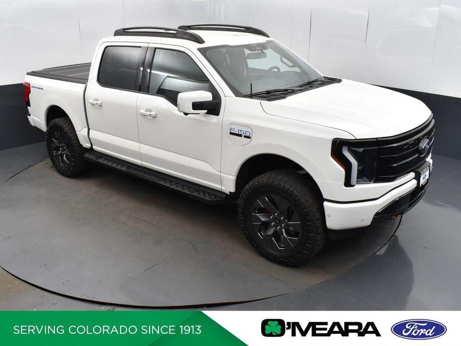 used 2023 Ford F-150 Lightning car, priced at $53,990