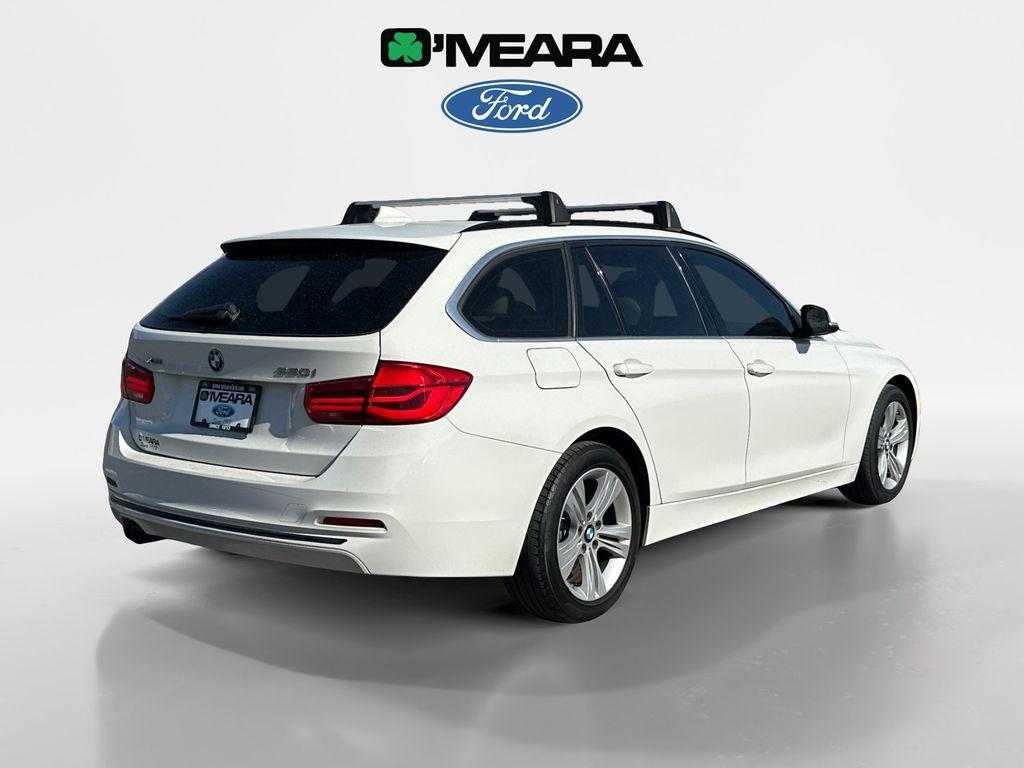 used 2018 BMW 330 car, priced at $19,990
