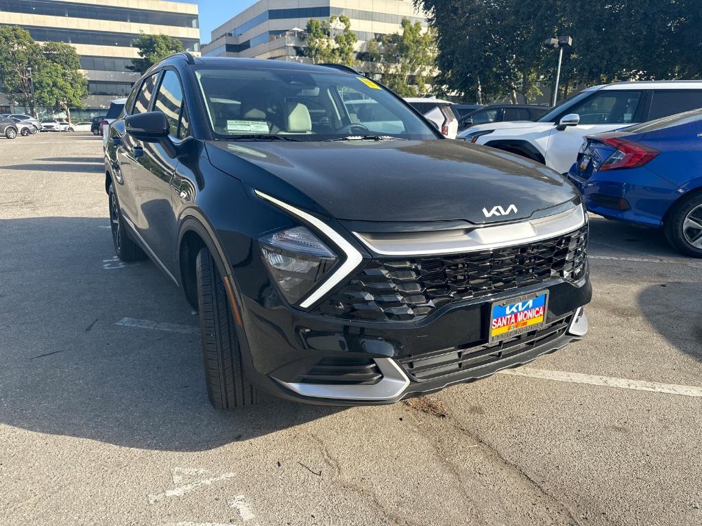 used 2023 Kia Sportage Hybrid car, priced at $27,399