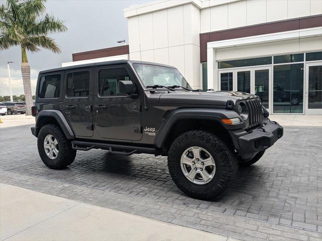 used 2018 Jeep Wrangler Unlimited car, priced at $24,977