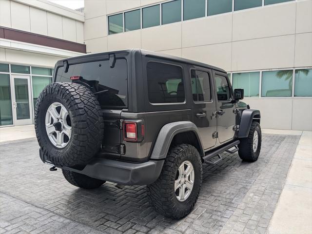 used 2018 Jeep Wrangler Unlimited car, priced at $24,977