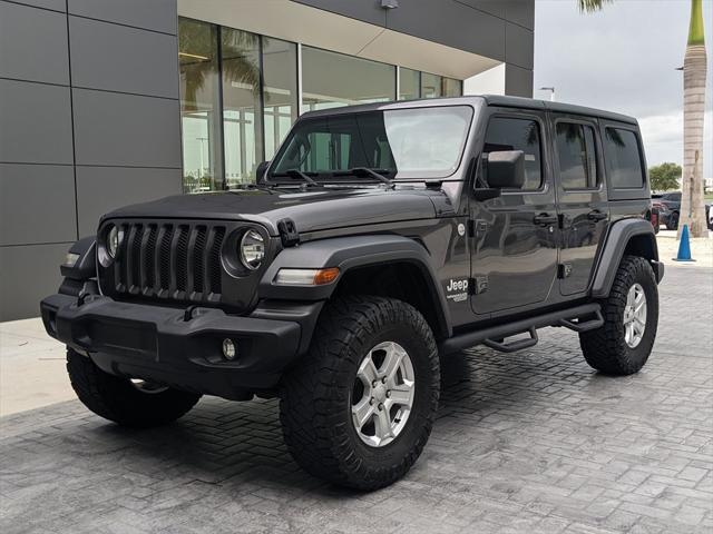used 2018 Jeep Wrangler Unlimited car, priced at $24,977