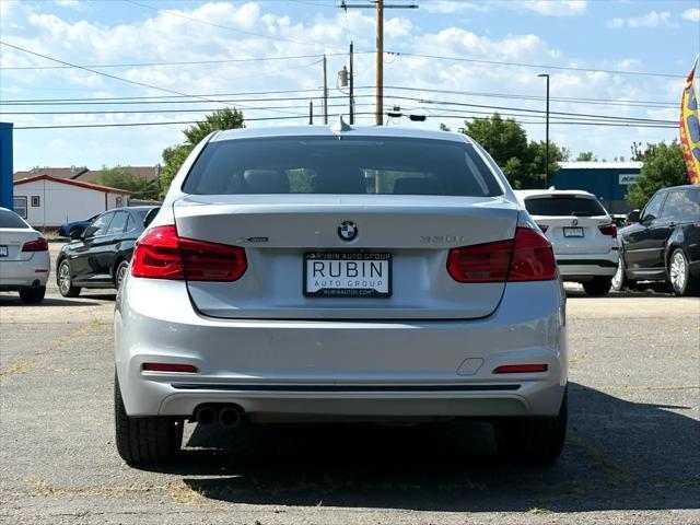 used 2018 BMW 330 car, priced at $15,300