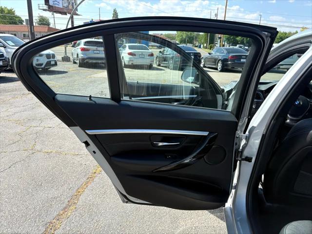 used 2018 BMW 330 car, priced at $15,300