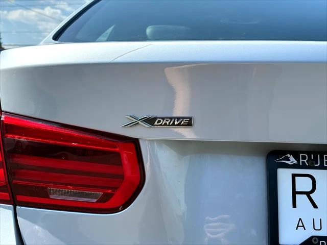 used 2018 BMW 330 car, priced at $15,300