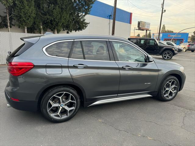 used 2016 BMW X1 car, priced at $15,300