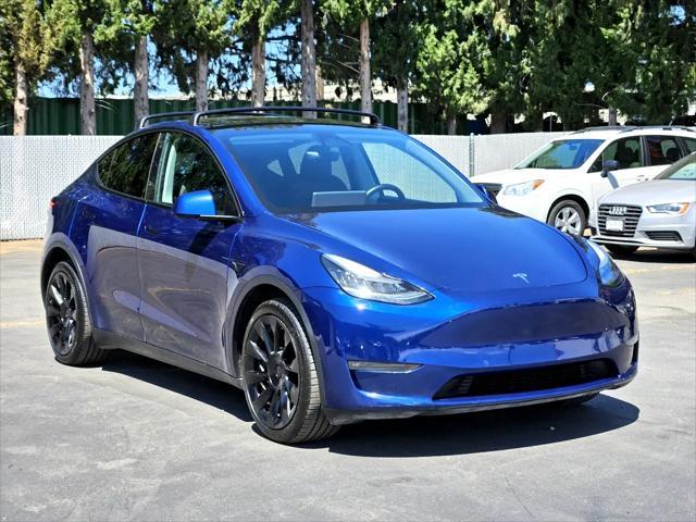 used 2020 Tesla Model Y car, priced at $25,200