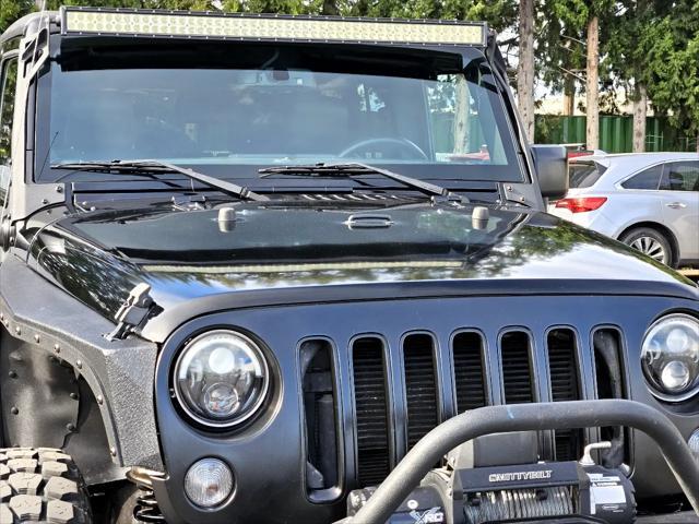 used 2016 Jeep Wrangler Unlimited car, priced at $26,997