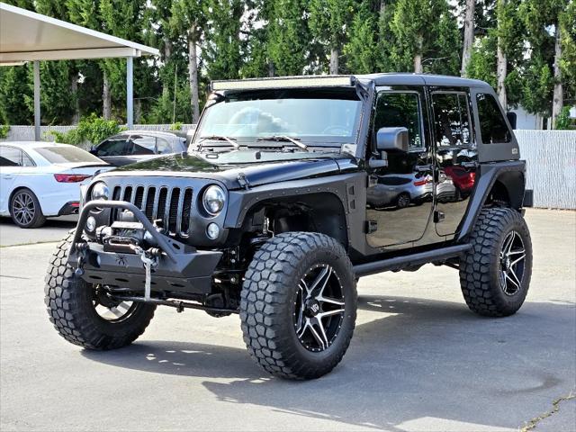 used 2016 Jeep Wrangler Unlimited car, priced at $26,997