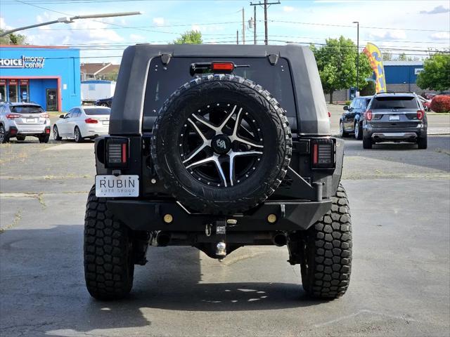 used 2016 Jeep Wrangler Unlimited car, priced at $26,997