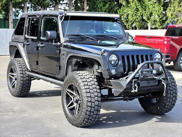 used 2016 Jeep Wrangler Unlimited car, priced at $26,997