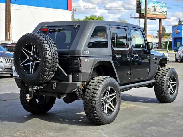 used 2016 Jeep Wrangler Unlimited car, priced at $26,997