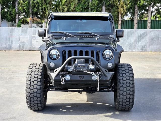 used 2016 Jeep Wrangler Unlimited car, priced at $26,997
