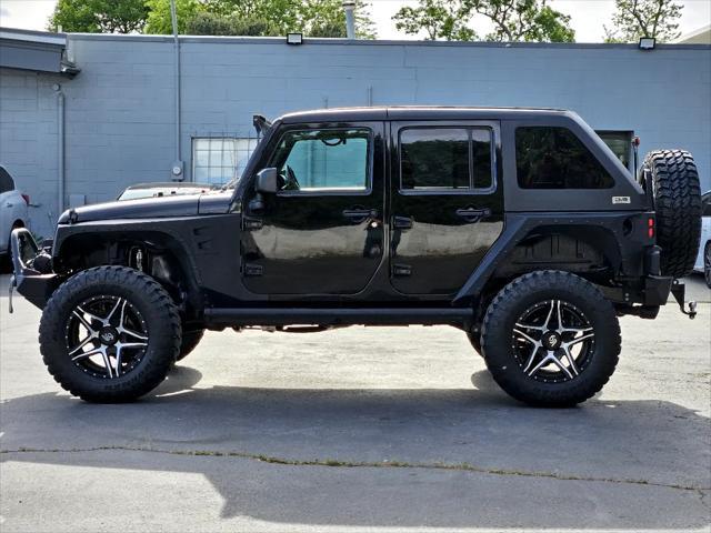 used 2016 Jeep Wrangler Unlimited car, priced at $26,997