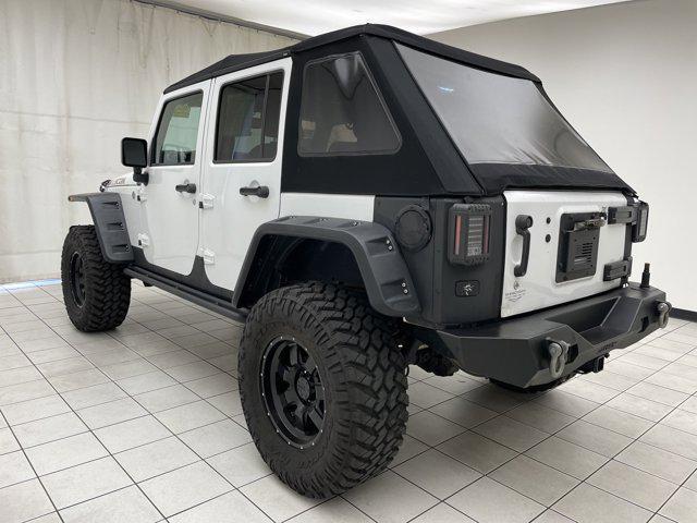 used 2015 Jeep Wrangler Unlimited car, priced at $21,366