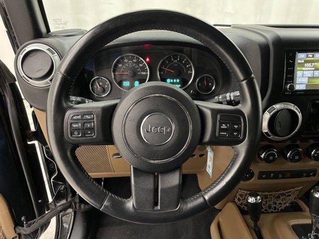 used 2015 Jeep Wrangler Unlimited car, priced at $19,864