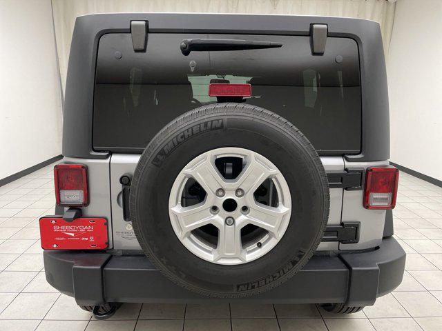 used 2018 Jeep Wrangler JK Unlimited car, priced at $23,679