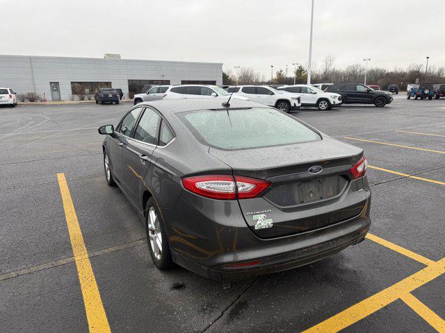 used 2016 Ford Fusion car, priced at $10,714