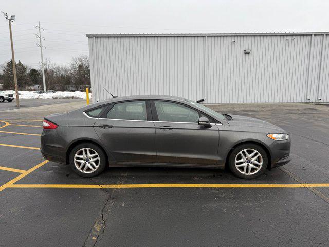 used 2016 Ford Fusion car, priced at $10,714