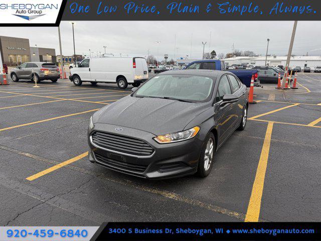 used 2016 Ford Fusion car, priced at $10,714