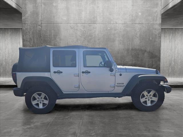 used 2012 Jeep Wrangler Unlimited car, priced at $14,995