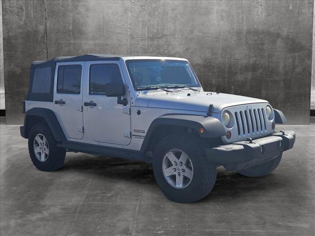 used 2012 Jeep Wrangler Unlimited car, priced at $14,995