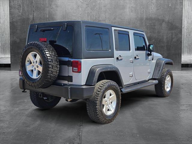 used 2013 Jeep Wrangler Unlimited car, priced at $16,556
