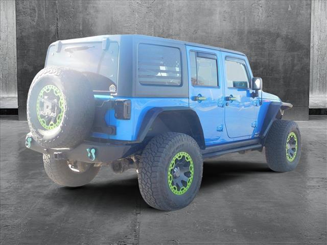 used 2016 Jeep Wrangler Unlimited car, priced at $26,976