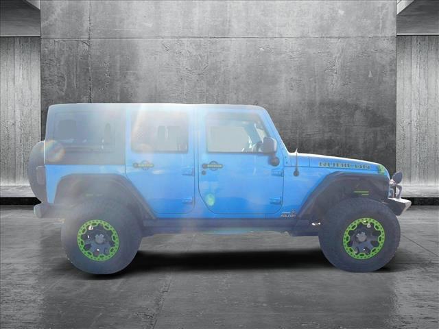 used 2016 Jeep Wrangler Unlimited car, priced at $26,976