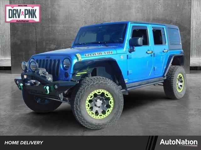 used 2016 Jeep Wrangler Unlimited car, priced at $26,976