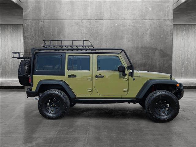 used 2013 Jeep Wrangler Unlimited car, priced at $18,995