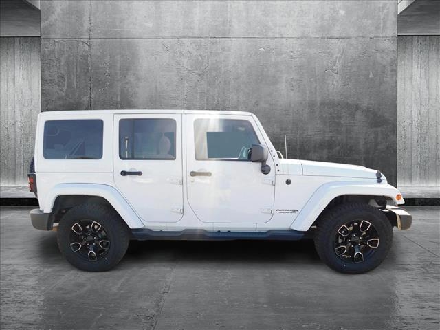 used 2018 Jeep Wrangler JK Unlimited car, priced at $22,305