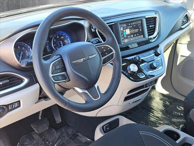used 2023 Chrysler Voyager car, priced at $18,357