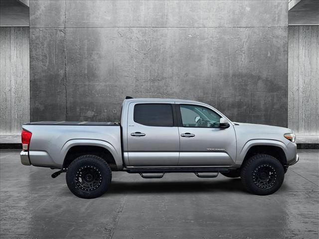 used 2021 Toyota Tacoma car, priced at $28,556