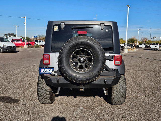 used 2013 Jeep Wrangler Unlimited car, priced at $15,995