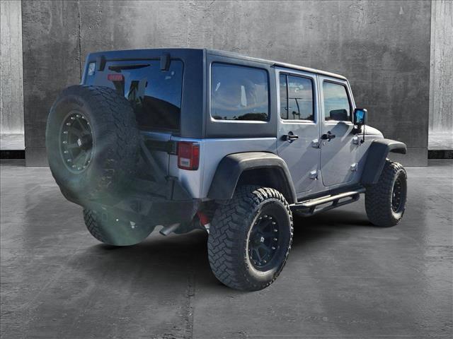 used 2013 Jeep Wrangler Unlimited car, priced at $15,995