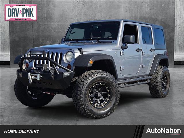 used 2013 Jeep Wrangler Unlimited car, priced at $15,556