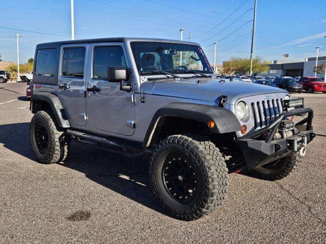 used 2013 Jeep Wrangler Unlimited car, priced at $15,995