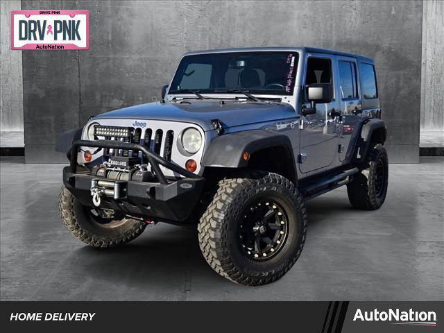 used 2013 Jeep Wrangler Unlimited car, priced at $15,995