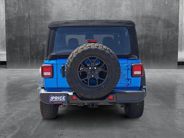 used 2024 Jeep Wrangler car, priced at $34,762