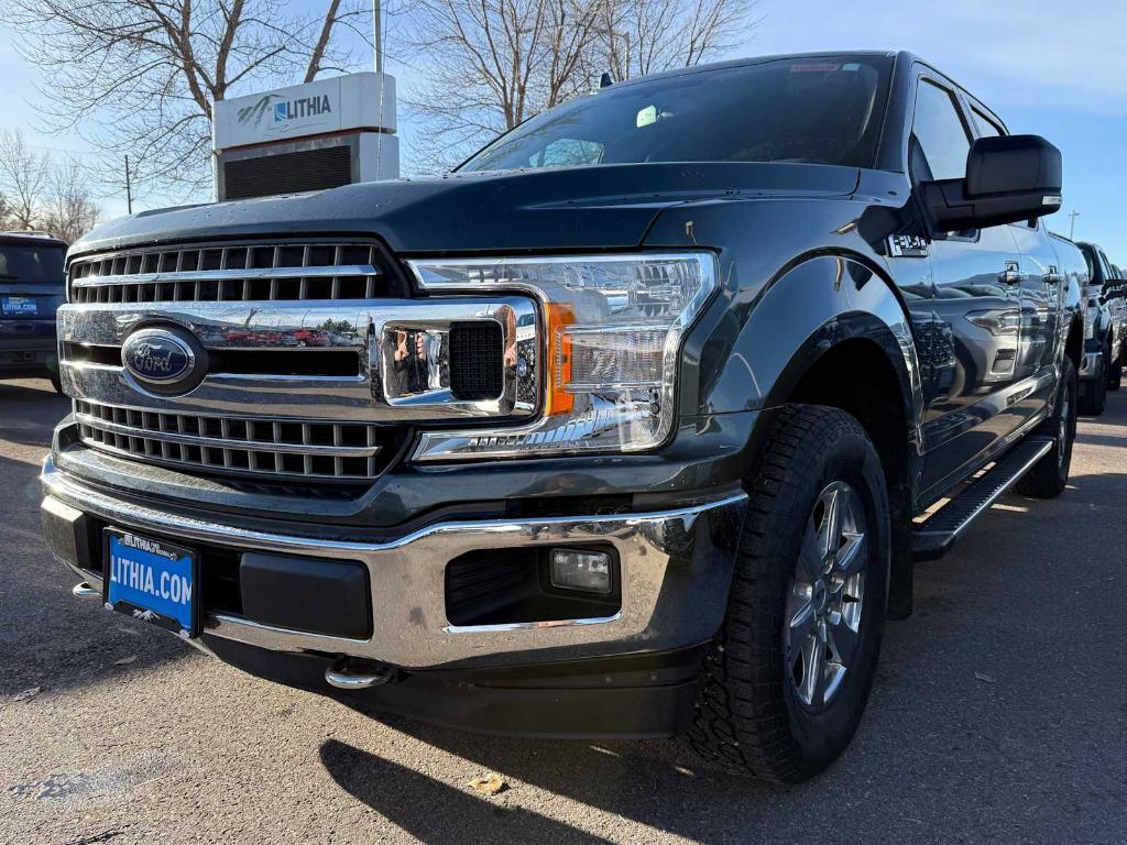 used 2018 Ford F-150 car, priced at $28,301