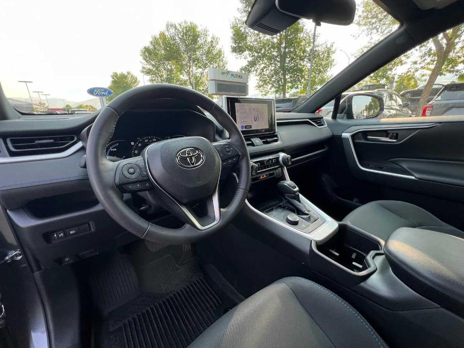 used 2023 Toyota RAV4 Hybrid car, priced at $32,000