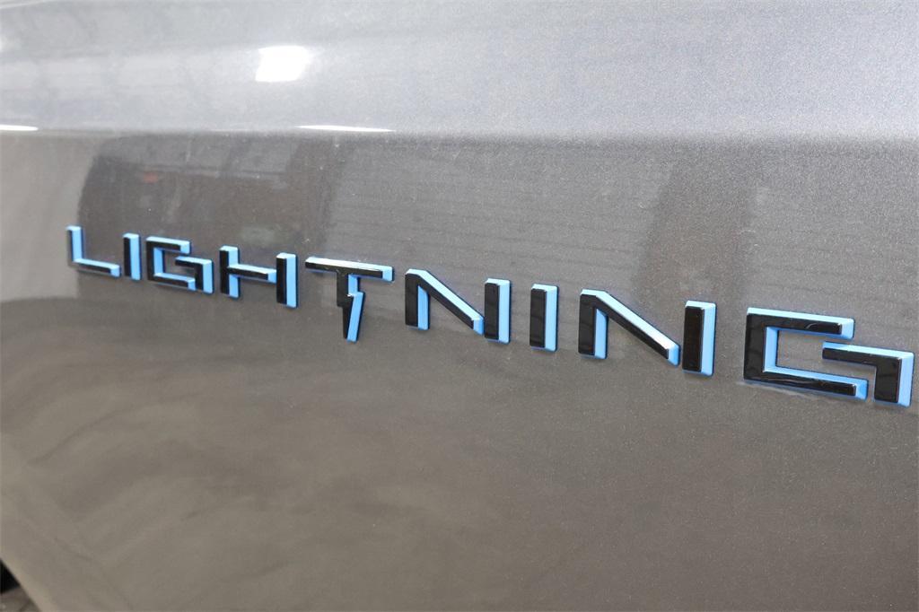 new 2025 Ford F-150 Lightning car, priced at $74,705
